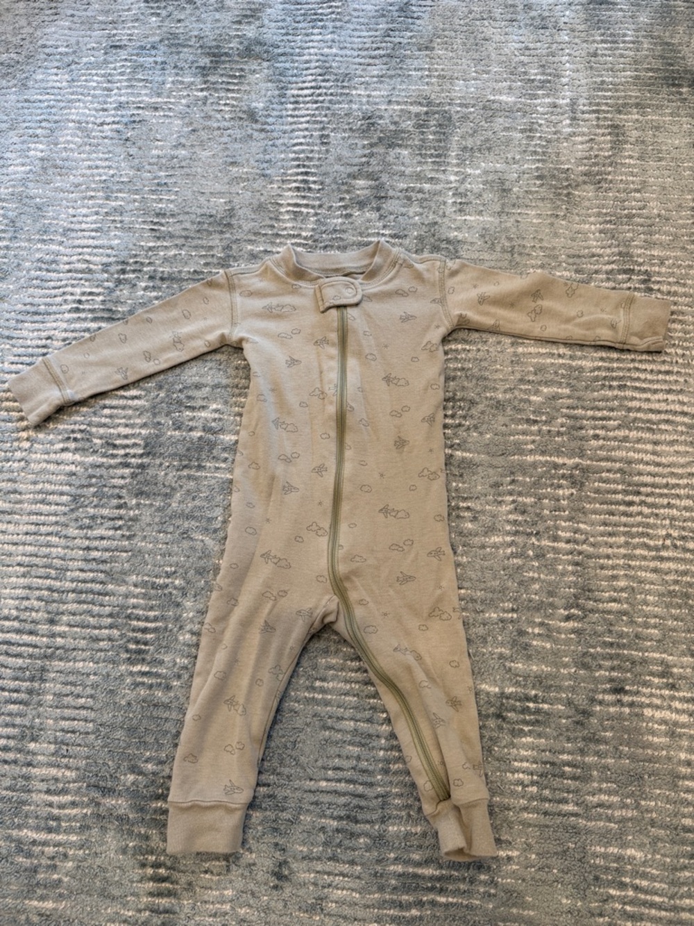 Quincy Mae Green onesie with plane and cloud design